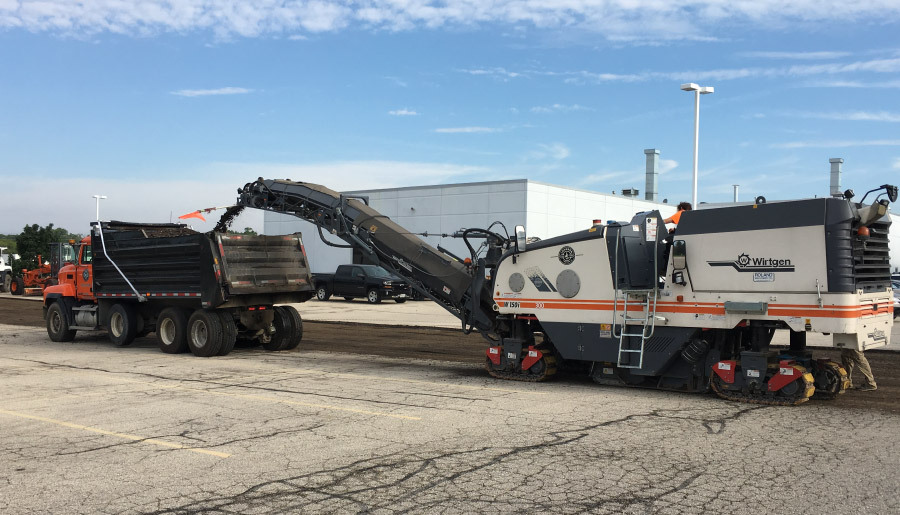 Johnson and Sons Paving trucks working