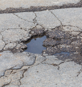 Pothole in Old Pavement